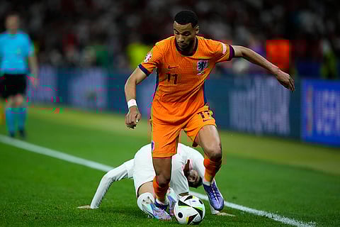 Cody Gakpo of the Netherlands controls the ball